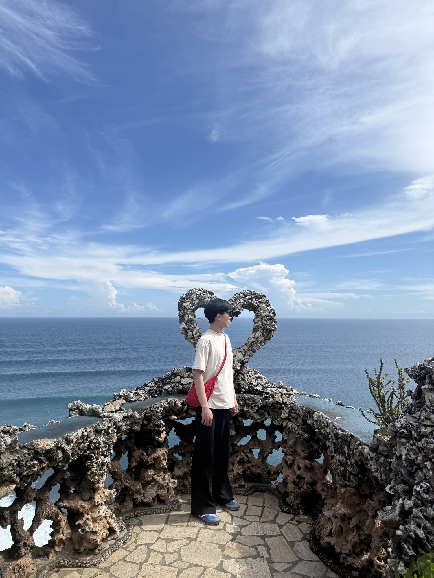 Standing by heart sculpture
